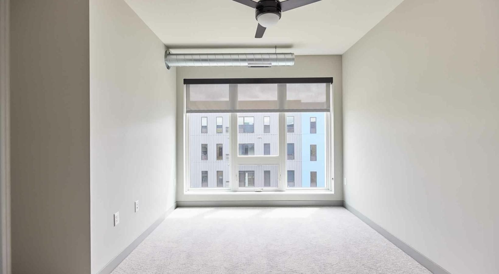 Find your perfect fit at Pivot a room with a ceiling fan and a window