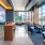 a room with a large glass wall and a large window