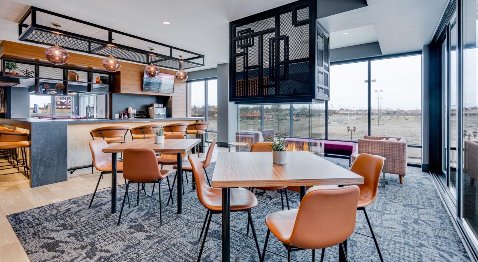 The essence of exceptional living a room with tables and chairs